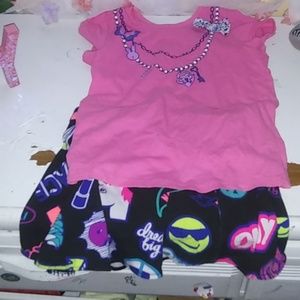 Pink top with black skirt